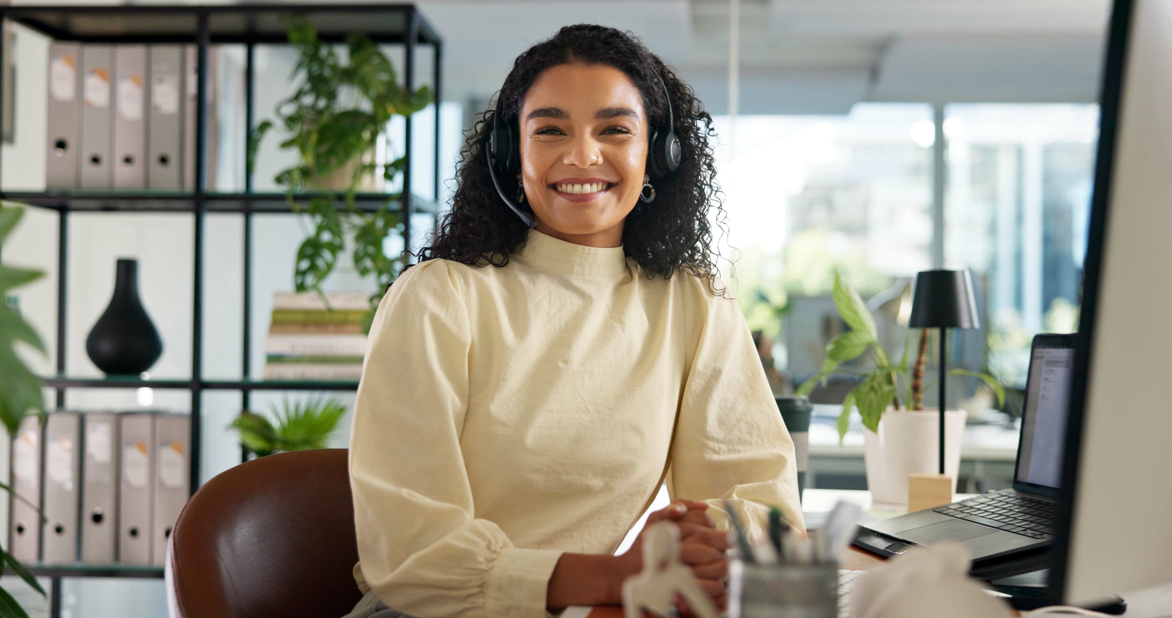 Call center, happy woman and customer service in portrait with confidence, communication and online consulting. Proud, virtual chat or smile for contact support, help desk or sales agent for business.